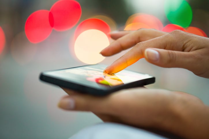 woman using mobile phone