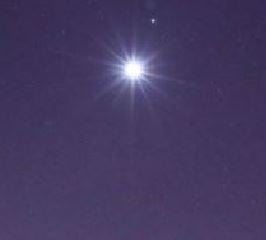 Moon and Jupiter in the night sky early Friday morning