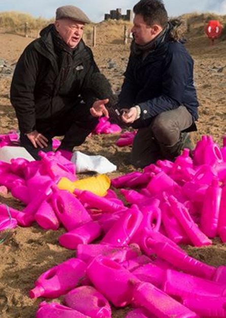 Organising the cleanup of the pink plastic bottles of detergent