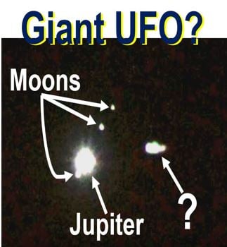 Giant UFO near Jupiter and its moons