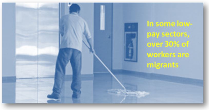 male worker cleaning floor