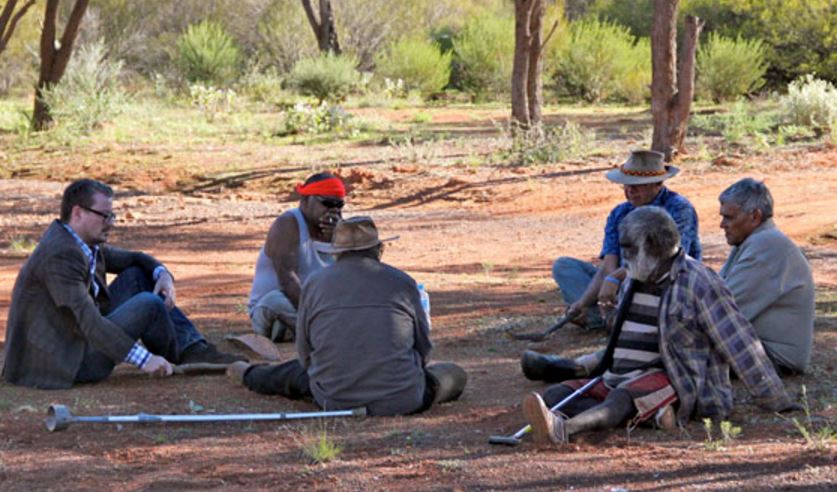 Professor Willerslev talking to community elders