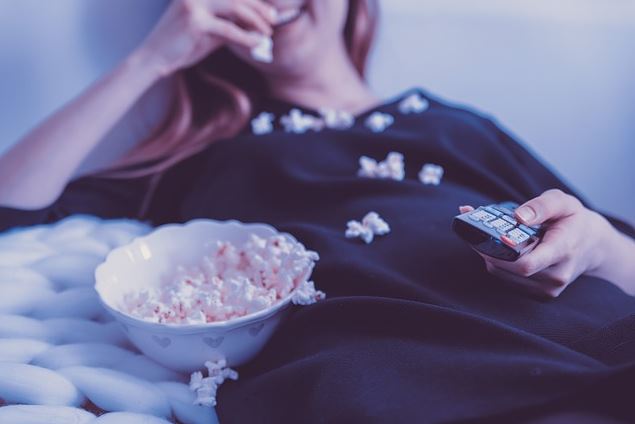 Woman watching a movie image