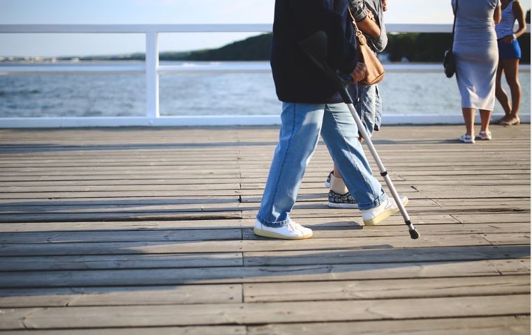 Woman with walking stick image 44 - workplace injury