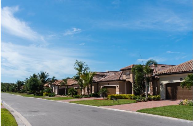 Buy and sell you property - image of street with houses