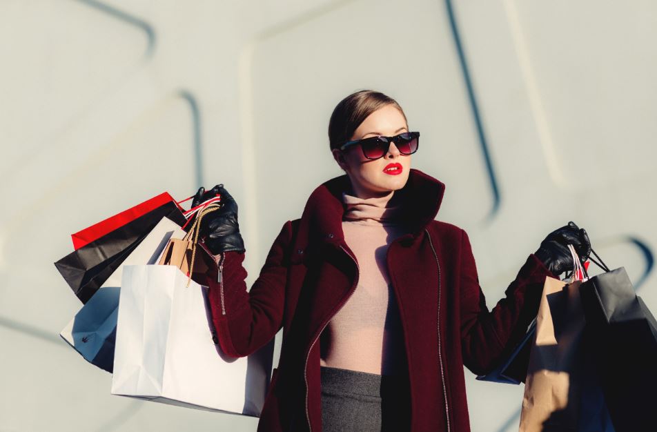 Express yourself - a woman with lots of shopping bags