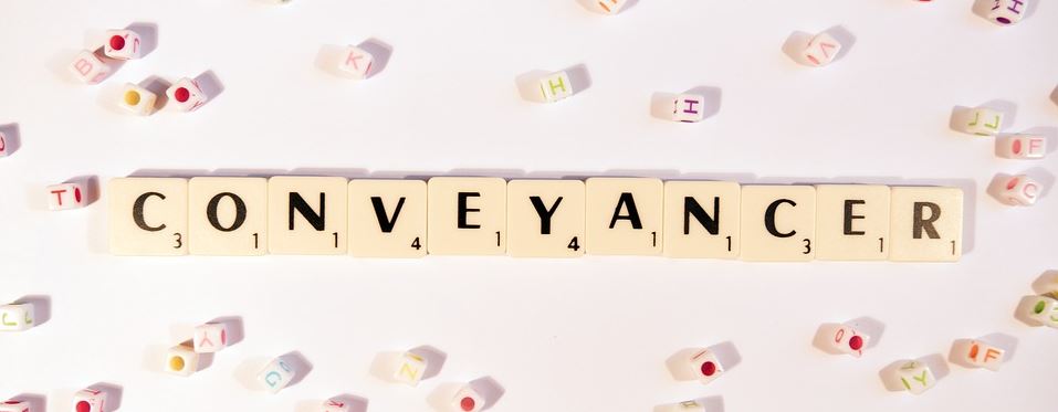 Getting the right conveyancer - scrabble squares spelling conveyancer