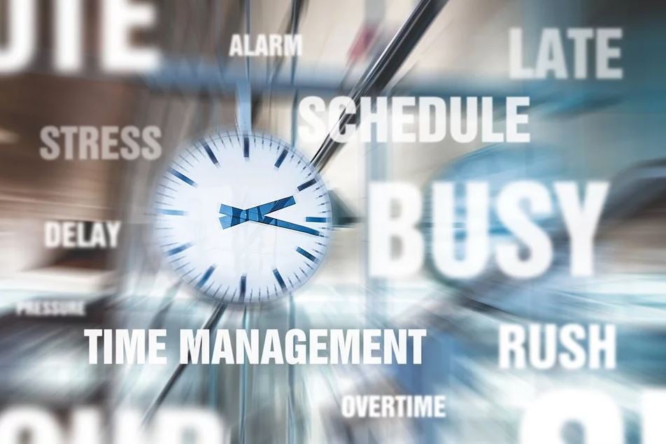 Image with a large clock - time management theme