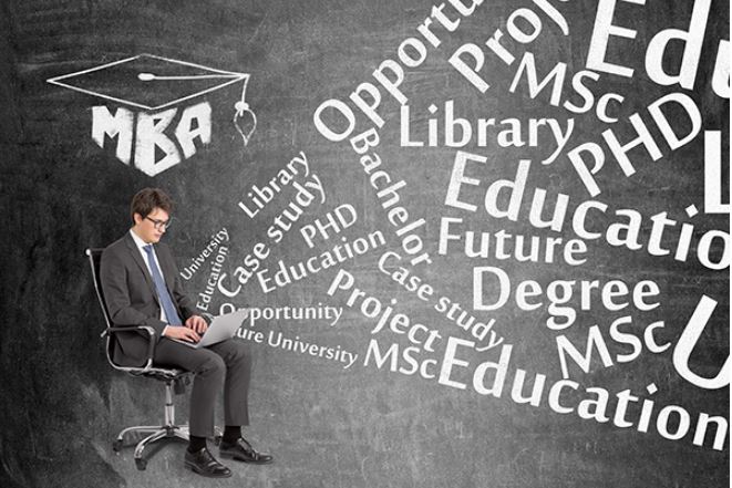 Master of Business Administration - man in front of blackboard sitting