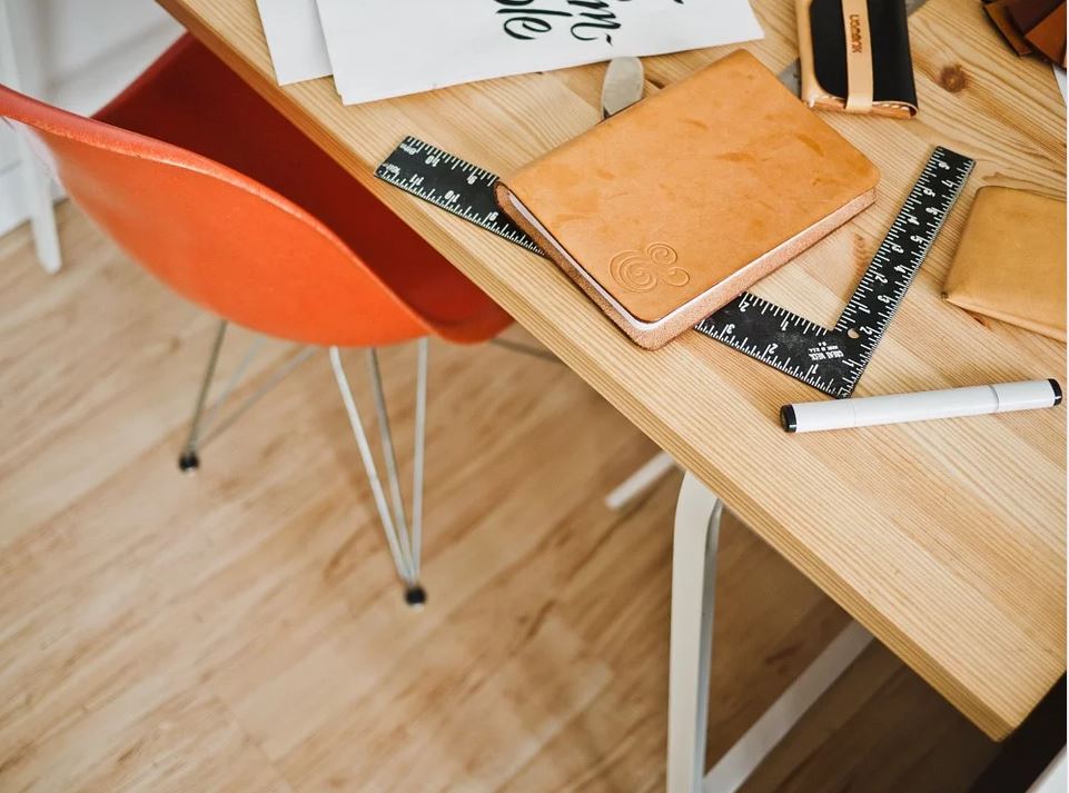 Desk and chair on a hardwood floor 333