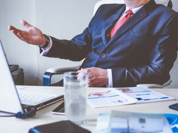 Man sitting at desk - energy consultant article 32333