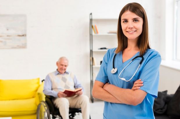 Doctor and man on wheelchair