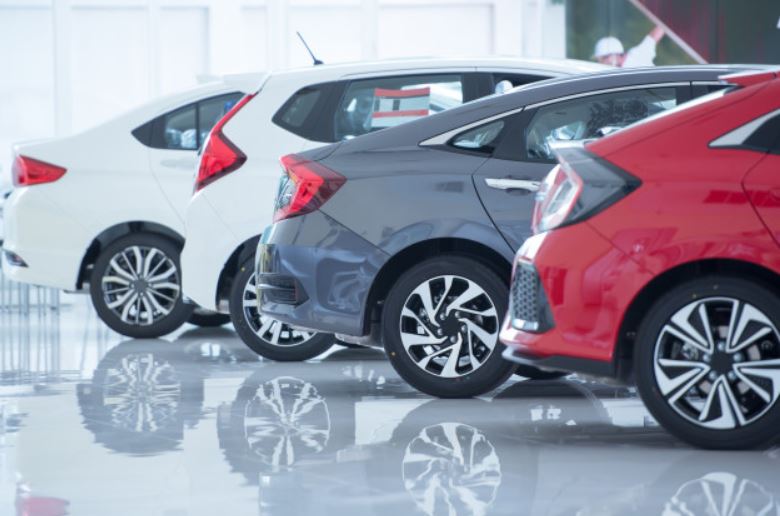 Row of cars in a showroom 49839839