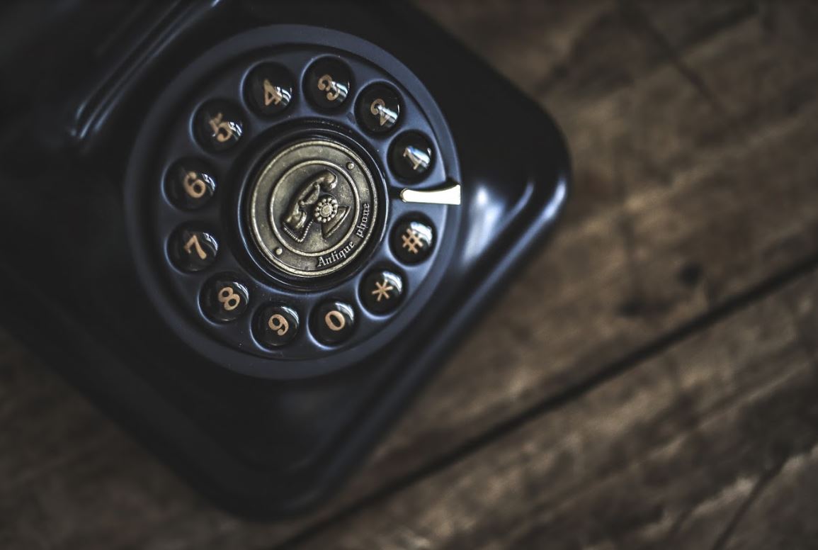 Auto dialers - image for article - a button phone