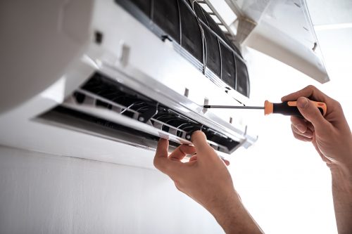 A/C unit being fixed.