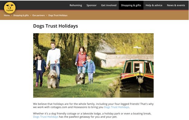 Family with dog and barge on canal