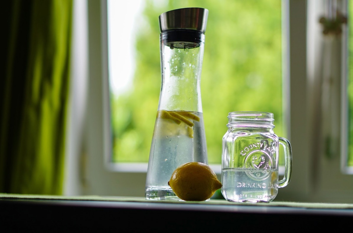 What is essential for life - Pitcher of water with lemon slices