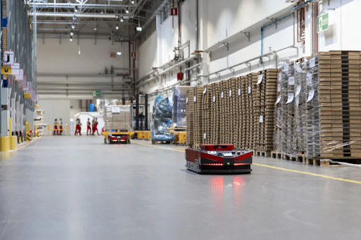 AMRs (VERSABOTs) driving through a warehouse