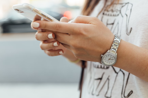 woman holding iphone