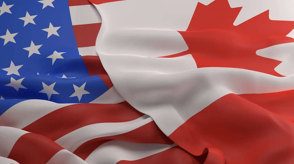 US flag and Canadian flag
