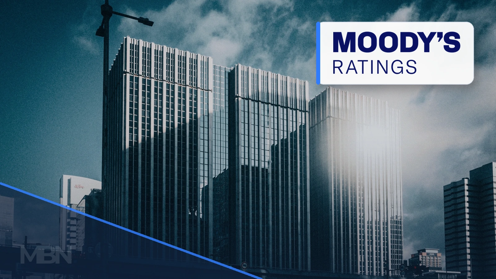 Editorial composite of modern corporate towers with the Moody's Ratings logo