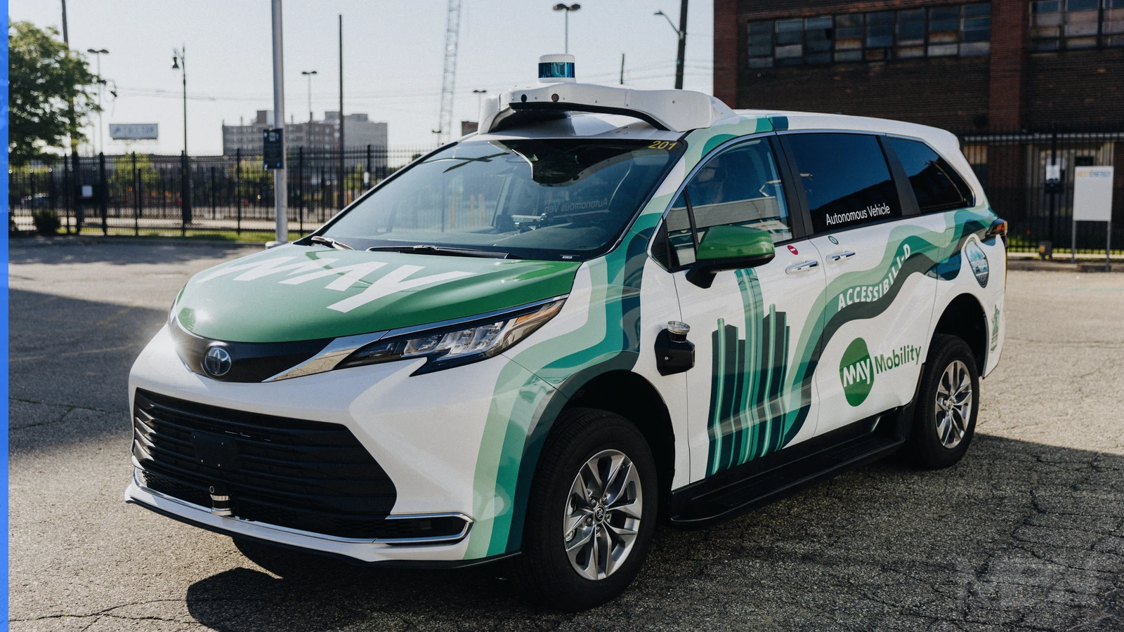 A May Mobility autonomous vehicle on a Detroit street, photographed in 2024.