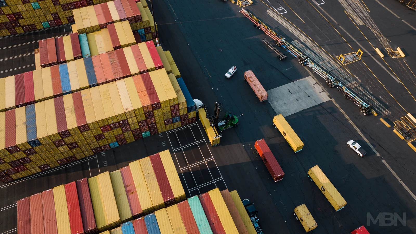 Containers and vehicles at a Seattle port. Representative photograph, unrelated to any rejected financing application