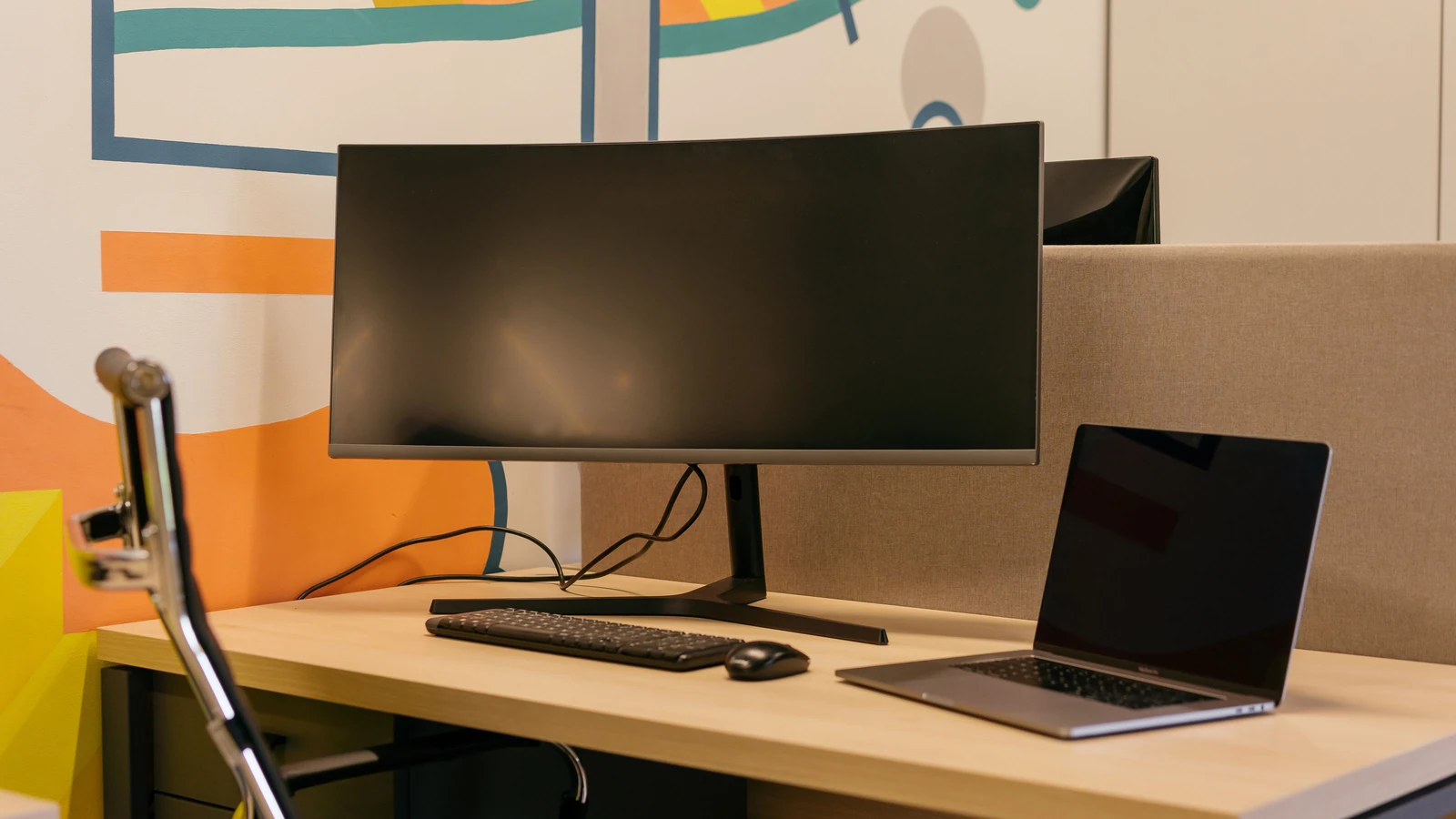 A desktop monitor and laptop on an office desk, a representative business software photograph by Mikhail Nilov from Pexels.