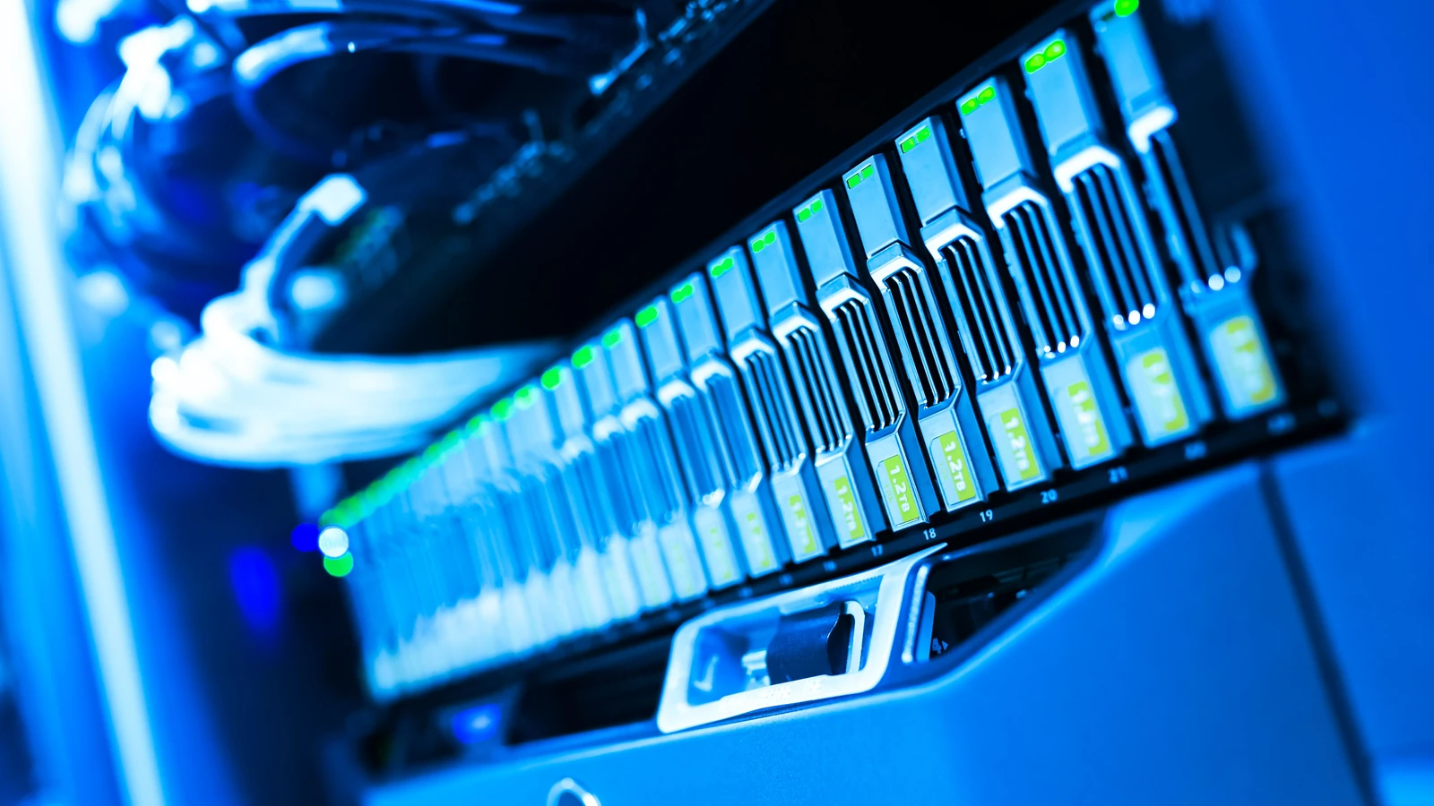 Blue-lit server hardware and cables, a representative data security photograph by panumas nikhomkhai from Pexels.