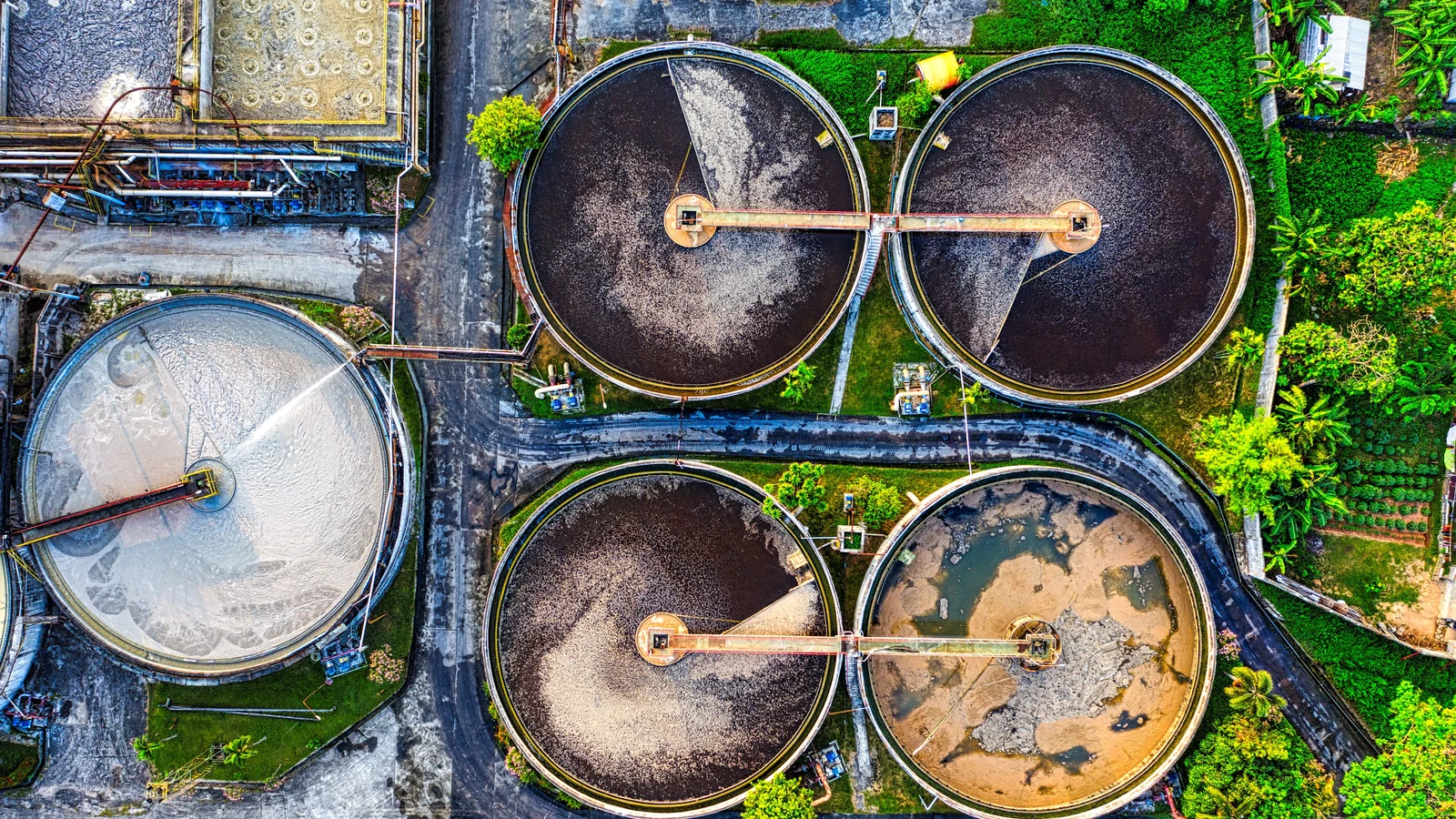 Circular tanks at a water treatment plant in Indonesia, used as a representative photograph by Tom Fisk for Pexels.